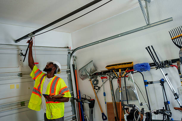 Professional Garage Door Panel Replacement technician working in Brent, FL